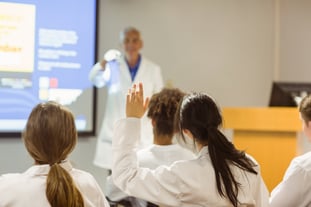 Science professor giving lecture to class at the university-1