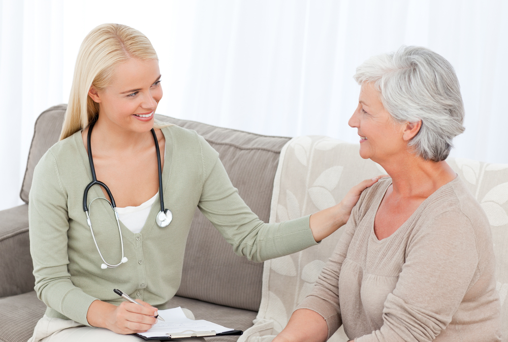 Doctor talking with her patient